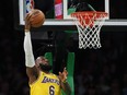 LeBron James #6 of the Los Angeles Lakers takes a shot against the Boston Celtics during the first half at TD Garden on January 28, 2023 in Boston, Massachusetts.