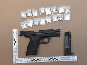 Denzel Smith, 29, of Toronto, faces firearms and gun charges after Peel cops seized this loaded Smith and Wesson handgun and quantity of suspected cocaine on Monday, Jan. 16, 2023.