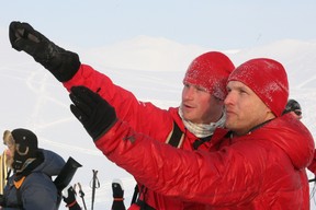 Prince Harry (left) talks to team leader Inge Solheim as he joins the Walking with the Wounded team, who have gathered on the island of Spitsbergen – situated between the Norwegian mainland and the North Pole – for their last days of preparation before setting off to the North Pole by foot on March 29, 2011 in Spitsbergen, Norway.