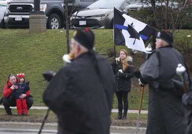 Residents came out braving the weather to pay their respects at the funeral procession for slain OPP Const. Grzegorz Pierzchala, held in Barrie. The funeral took place at the Sadlon Arena on Bayview Dr.  on Wednesday January 4, 2023. Jack Boland/Toronto Sun/Postmedia Network