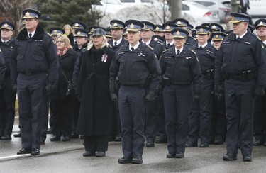 OPP Commissioner Tom Carrique leads a large group of officers down Bayview Dr. in Barrie at the funeral procession for slain OPP Const. Grzegorz Pierzchala. The funeral took place at the Sadlon Arena on Bayview Dr.  on Wednesday January 4, 2023. Jack Boland/Toronto Sun/Postmedia Network