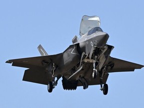 In this file photo taken on July 19, 2022 a Lockheed Martin F-35 fighter jet takes part in a flying display at the Farnborough Airshow in Farnborough. Canada confirmed on Jan. 9, 2023 the purchase of 88 US F-35 fighter jets to replace its aging fleet for 19 billion Canadian dollars (US$14.2 billion), the largest investment in 30 years.