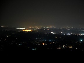 An aerial view shows Pakistan's capital Islamabad during a nationwide power outage on January 23, 2023.