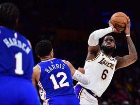 Los Angeles Lakers forward LeBron James (6) shoots against Philadelphia 76ers forward Tobias Harris (12) during the second half at Crypto.com Arena Jan. 15, 2023.