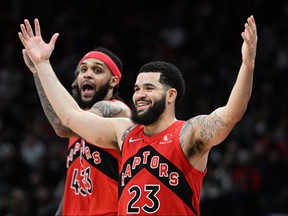 Toronto Raptors guard Fred VanVleet  celebrates after causing a turnover as guard Gary Trent Jr. reacts in the second half against the Minnesota Timberwolves at Scotiabank Arena.