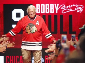 Former Chicago Blackhawk Bobby Hull is introduced to the fans during the NHL hockey team's convention Friday, July 15, 2016, in Chicago. (AP Photo/Charles Rex Arbogast)