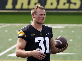 Iowa linebacker Jack Campbell looks on during a college football media day, Friday, Aug. 12, 2022, in Iowa City, Iowa.