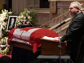 Ontario Premier Doug Ford speaks during the state funeral of former Ontario lieutenant-governor David Onley in Toronto, Monday, Jan.30, 2023.