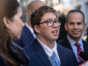 In this Dec. 5, 2019 file photo, transgender student Drew Adams speaks with reporters outside of the 11th Circuit Court of Appeals in Atlanta.