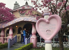 Visitors enter Minnie’s House in Mickey’s Toontown at Disneyland in Anaheim before the pandemic. Amy Taxin/AP