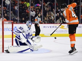 Maple Leafs' goaltender Matt Murray (left) makes a save on Flyers' Noah Cates during the second period on Sunday, Jan. 8, 2023, in Philadelphia.