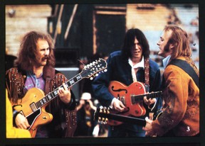 David Crosby, Neil Young and Graham Nash perform at a concert in San Diego in 1969.