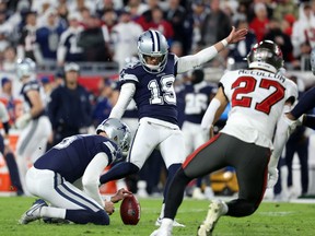 Dallas Cowboys place kicker Brett Maher (19) misses a point after touchdown kick in the first half during the wild card game at Raymond James Stadium Jan. 16, 2023.