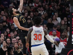 Raptors guard Fred VanVleet (23) drives to the basket over Knicks forward Julius Randle (30) during second quarter NBA action at Scotiabank Arena in Toronto, Friday, Jan. 6, 2023.