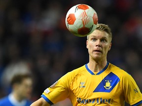 Brondby's Norwegian defender Sigurd Rosted keeps his eye on the ball during the UEFA Europa League group A football match between Rangers and Brondby at the Ibroxii Stadium in Glasgow on October 21, 2021.
