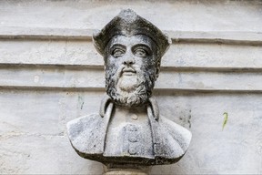 Water fountain with a bust of Michel de Nostradame or Nostradamus in the Old Town of his hometown and birthplace of Saint-Remy-de-Provence, France – Joaquin Ossorio-Castillo/Nostradamus/Getty Images