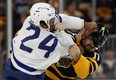 Maple Leafs'  Wayne Simmonds fights with former teammate Nick Foligno of the Bruins during the first period at TD Garden.