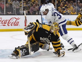 Boston Bruins goaltender Linus Ullmark makes a sprawling pad save on Toronto Maple Leafs centre Auston Matthews during the second period at TD Garden.