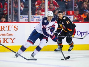 Jan 23, 2023; Calgary, Alberta, CAN; Columbus Blue Jackets left wing Patrik Laine (29) controls the puck against the Calgary Flames during the third period at Scotiabank Saddledome. Mandatory Credit: Sergei Belski-USA TODAY Sports