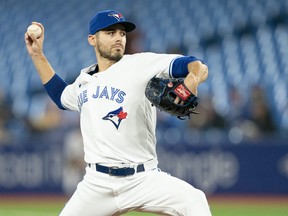 Toronto Blue Jays pitcher Julian Merryweather throws a pitch against the Tampa Bay Rays during the first inning at Rogers Centre in Toronto, Sept. 13, 2022.