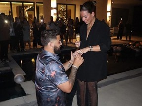 In an image posted to Instagram, Blue Jays pitcher Alek Manoah proposes to girlfriend Marielena Somoza.