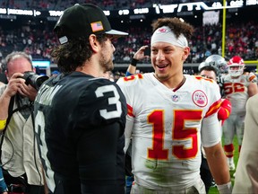 Jarrett Stidham of the Las Vegas Raiders and Patrick Mahomes of the Kansas City Chiefs meet on the field after their game at Allegiant Stadium on Jan. 7, 2023 in Las Vegas, Nevada.