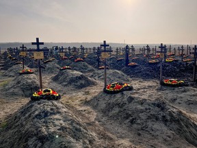 Graves of Russian Wagner mercenary group fighters are seen in a cemetery near the village of Bakinskaya in Krasnodar region, Russia, Jan. 22, 2023.