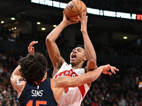 Toronto Raptors forward Scottie Barnes (4) shoots the ball over New York Knicks centre Jericho Sims (45) in the second half at Scotiabank Arena.