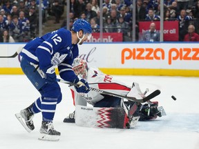Maple Leafs forward Zach Aston-Reese scores on Washington Capitals goaltender Charlie Lindgren during the third period at Scotiabank Arena on Sunday.