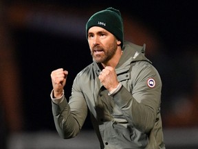 Canadian actor and Wrexham owner Ryan Reynolds acknowledges the fans after the English FA Cup fourth round match between Wrexham and Sheffield United at the Racecourse Ground Stadium in Wrexham, Wales, Sunday, Jan. 29, 2023.