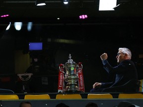 TV pundit and former player Gary Lineker is pictured with the FA Cup trophy on Jan. 17, 2023.