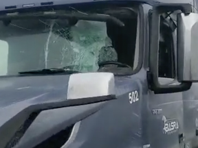 The OPP Highway Safety Division tweeted out a video around noon on Friday of a truck whose front windshield on the driver side was completely broken and smashed in after “chunks of ice” from another truck flew off and hit it.