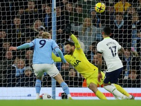 Manchester City's Erling Haaland scores his team's second goal in a 4-2 victory over Tottenham Hotspur at Etihad Stadium in Manchester on Jan. 19, 2023.