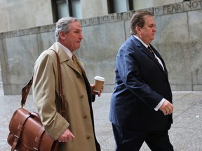 Trump Organization Attorneys Michael van der Veen and William Brennan arrive at the New York Supreme Court in New York City for the sentencing hearing of the Trump Organization, Friday, Jan. 13, 2023.