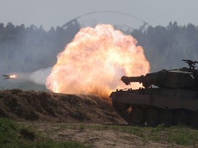 A Polish Leopard 2PL tank fires during Defender Europe 2022 military exercise of NATO troops at the military range in Bemowo Piskie, near Orzysz, Poland May 24, 2022.