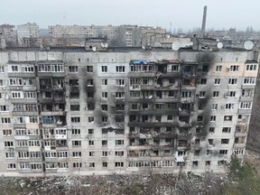 An aerial view shows damaged buildings, as Russia's attack on Ukraine continues, in Vuhledar, Donetsk region, Ukraine, in this screen grab taken from a handout video released on Jan. 27, 2023.