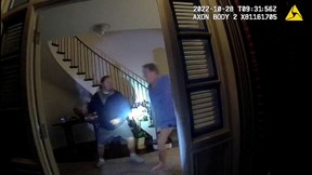 A screenshot from a police body camera video shows David DePape lifting a hammer to strike Paul Pelosi, the husband of then-House Speaker Nancy Pelosi, in the couple’s house on Oct. 28, 2022, in San Francisco, Calif.