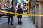 Toronto Police attend the scene after an elderly woman was killed in a suspected unprovoked assault at Yonge and King Sts.  in Toronto on Friday.  Jan 20, 2023.