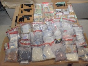 Firearms and drugs seized by Toronto Police as part of a robbery investigation.