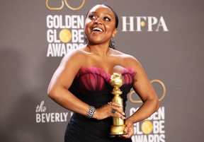Quinta Brunson poses with her award for best actress in a musical or comedy TV series for “Abbott Elementary.” MARIO ANZUONI/REUTERS