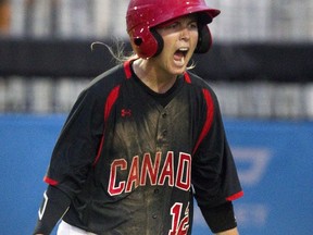 Canada's Ashley Stephenson reacts after scoring during fifth inning women's baseball action against Venezuela at the Pan American Games in Toronto on Saturday July 25, 2015. Stephenson, a long-time player and coach with Canada's women's baseball team, is joining the Toronto Blue Jays' organization as a coach with the Vancouver Canadians.