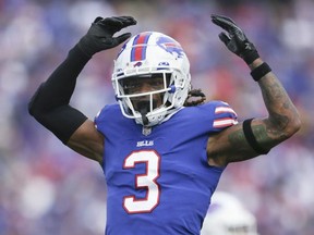FILE - Buffalo Bills safety Damar Hamlin reacts after a play during the first half of the team's NFL football game against the Pittsburgh Steelers on Oct. 9, 2022, in Orchard Park, N.Y. Hamlin released a video on Saturday, Jan. 28, in which he's thankful for the outpouring of support and vows to pay it back, in what are the safety's first public comments since he went went into cardiac arrest and needed to be resuscitated on the field in Cincinnati on Jan. 2.
