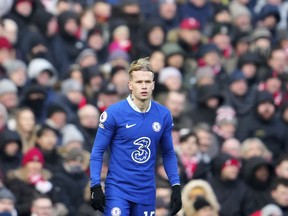 Chelsea's Mykhailo Mudryk enters the pitch after he replaced Chelsea's Lewis Hall during the English Premier League soccer match between Liverpool and Chelsea at Anfield stadium in Liverpool, England, Saturday, Jan. 21, 2023.