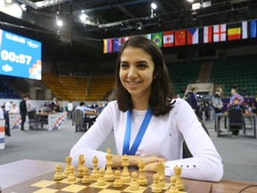 Chess - FIDE World Rapid and Blitz Championships 2022 - Blitz Women - Almaty, Kazakhstan - December 30, 2022. Sara Khadem of Iran sits in front of a chess board during a game.