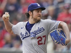 Los Angeles Dodgers starting pitcher Trevor Bauer delivers in the first inning of a baseball game against the Atlanta Braves on Sunday, June 6, 2021, in Atlanta.