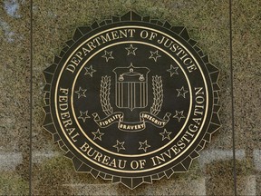 The FBI seal is seen outside HQ