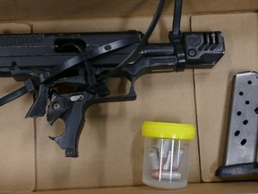 Four teens face a slew of charges and this gun was seized after $1.2 million in gold and silver was stolen during an armed robbery at a precious metals store near Bloor and Shaw Sts. on Dec. 10, 2022.
