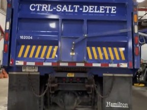 City of Hamilton snow plow truck named CTRL-SALT-DELETE.