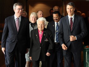 Ottawa Mayor Jim Watson, Mississauga Mayor Hazel McCallion, and Vancouver Mayor Gregor Robertson lead the Big City Mayors' Caucus out of chambers for a press conference at Ottawa City Hall, Nov. 15, 2012. (Julie Oliver/Ottawa Citizen)