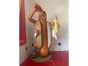A statue of a hot dog is shown at the Dairy Winkle restaurant, April 14, 2022, in the Campbells Creek ssection of Charleston, W.Va.